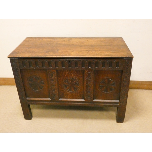 467 - An antique oak carved three panel coffer, 3'6 wide, 29