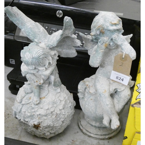 824 - Two fairies sitting on a ball