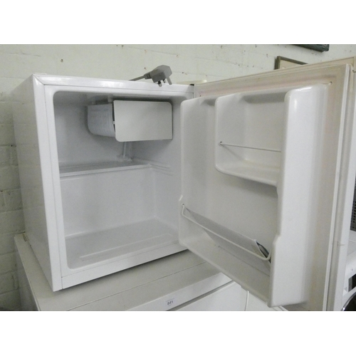 842 - A small table top fridge with ice box