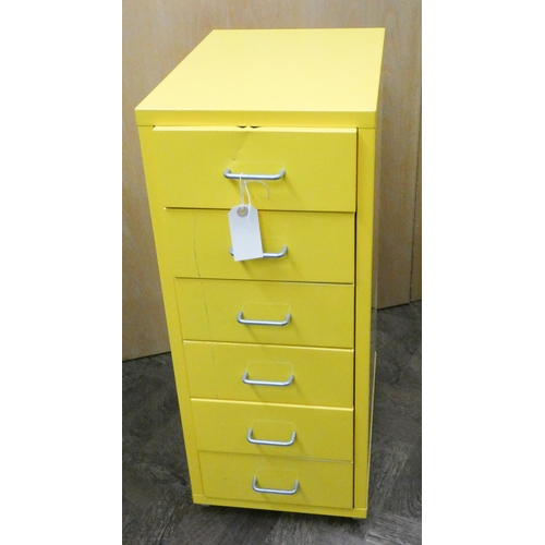 843 - A six drawer metal filing cabinet on wheels