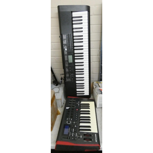 862 - A Casio electric keyboard and an Impulse motivation keyboard (no power pack)