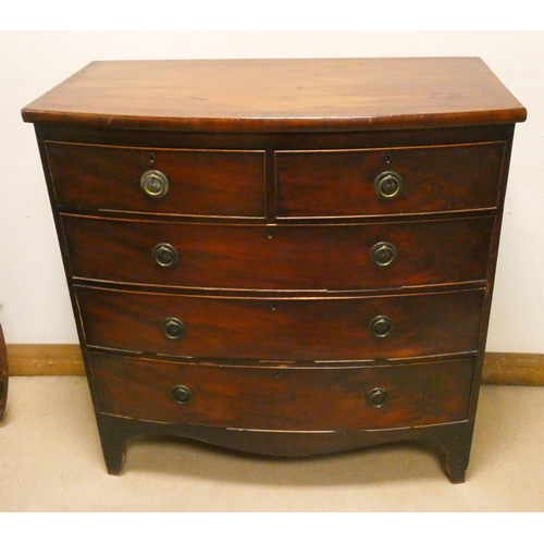 459 - Georgian mahogany bow front chest with three long and two short drawers with brass handles, standing... 