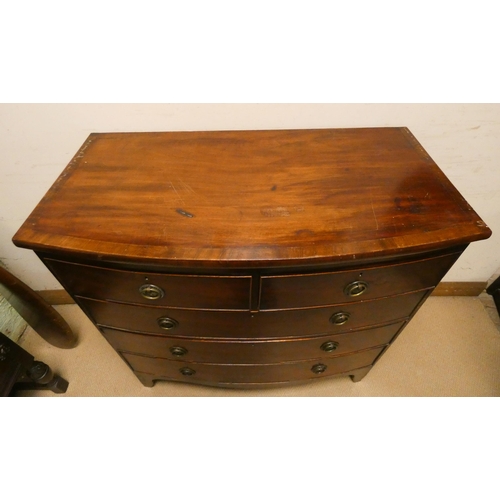 459 - Georgian mahogany bow front chest with three long and two short drawers with brass handles, standing... 