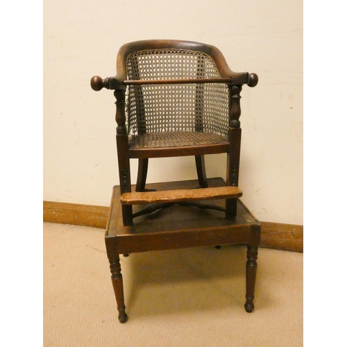 460 - A child's Victorian mahogany framed and cane panelled revolving high chair on mahogany table base