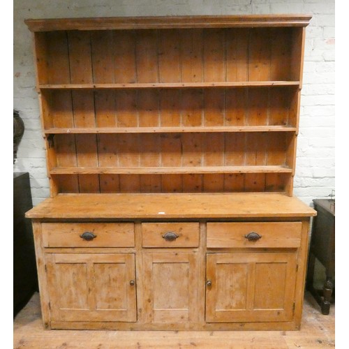 471 - A Victorian stripped pine dresser with shelf back, three drawers and cupboards under, 6' wide