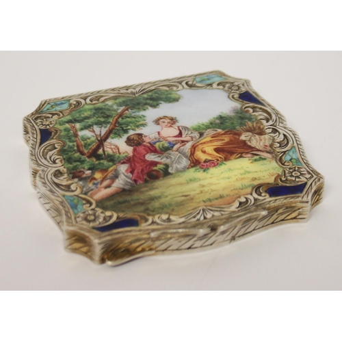 475 - A continental silver and enamel ladies compact, the lid finely enamelled with allegorical romantic s... 