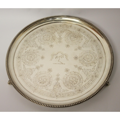 486 - Victorian silver circular salver, with engraved armorial and floral swag decoration. London 1876. 25... 