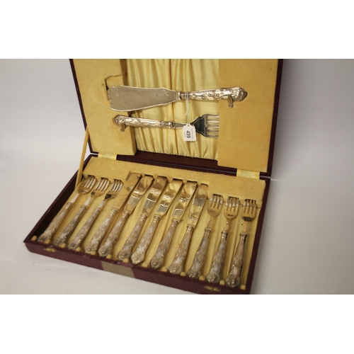 499 - A cased Kings Pattern silver handled fish eaters - set of 6 knives and forks and a set of servers.