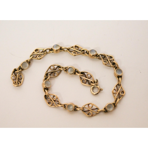 571 - An art nouveau style 9ct gold and moonstone bracelet. 20cms long, gross weight 8 grams