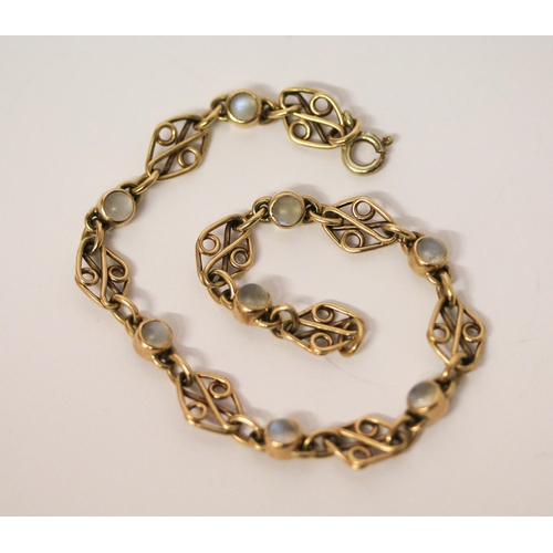 571 - An art nouveau style 9ct gold and moonstone bracelet. 20cms long, gross weight 8 grams