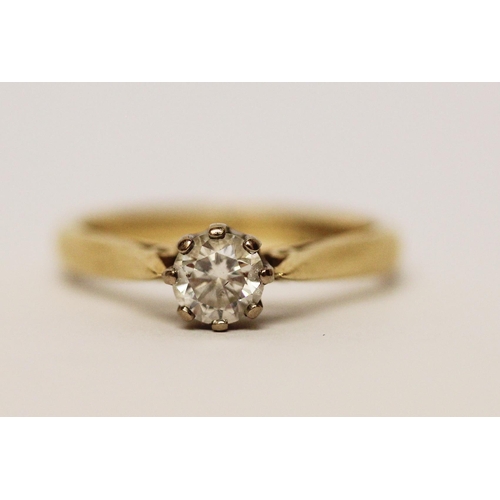 582 - A solitaire diamond ring, the claw set brilliant cut diamond weighing 0.5 carats, on hallmarked 18ct... 