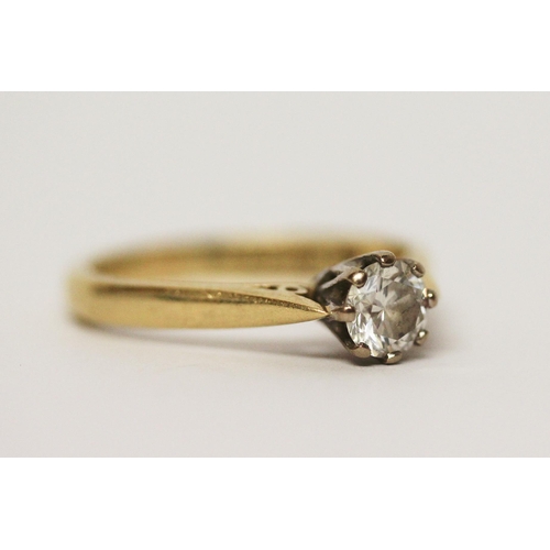 582 - A solitaire diamond ring, the claw set brilliant cut diamond weighing 0.5 carats, on hallmarked 18ct... 