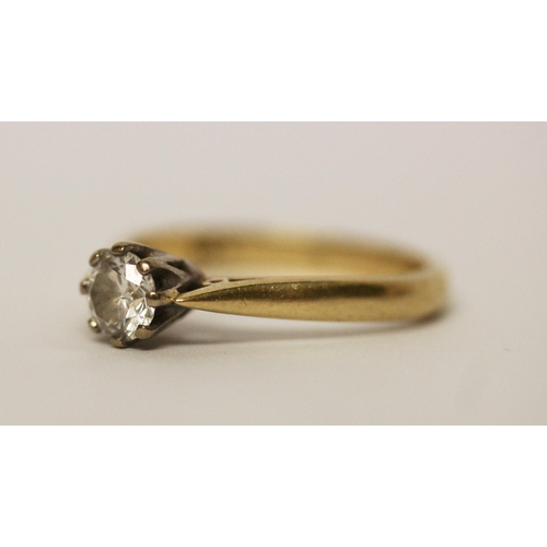 582 - A solitaire diamond ring, the claw set brilliant cut diamond weighing 0.5 carats, on hallmarked 18ct... 