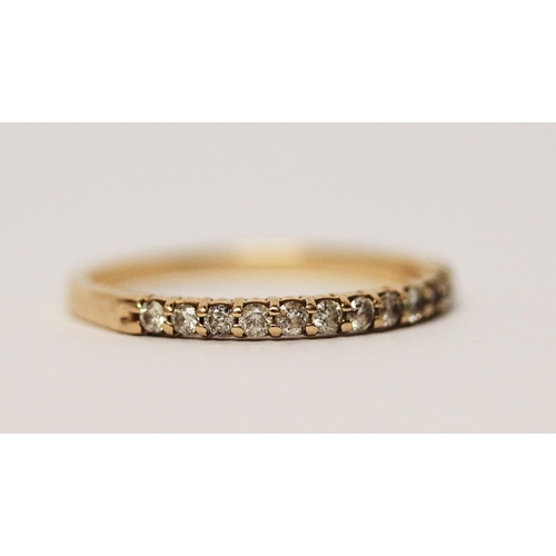 583 - 14ct yellow gold half hoop diamond set eternity ring, marked 14K. Ring size N