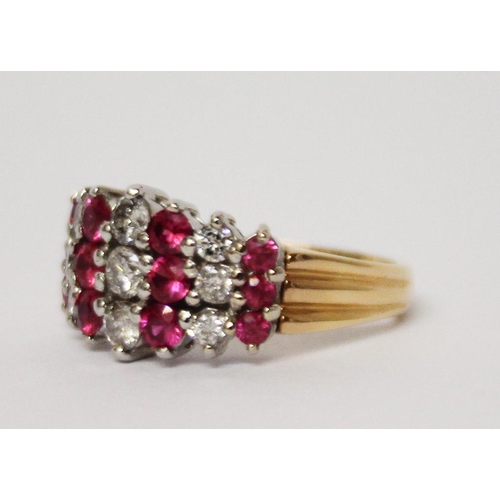 590 - 18ct gold ruby and diamond dress ring set with three rows of brilliant cut rubies and diamonds, gros... 