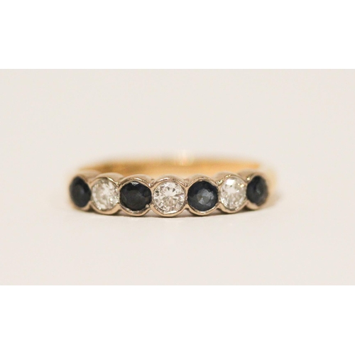 614 - Modern 18ct yellow gold sapphire and diamond half hoop eternity ring. Ring size J