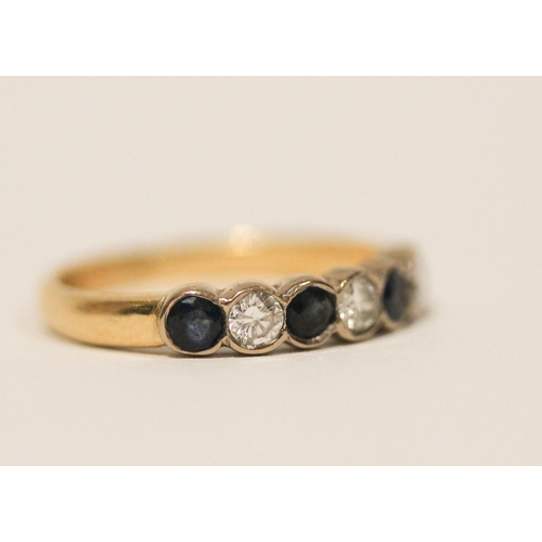 614 - Modern 18ct yellow gold sapphire and diamond half hoop eternity ring. Ring size J