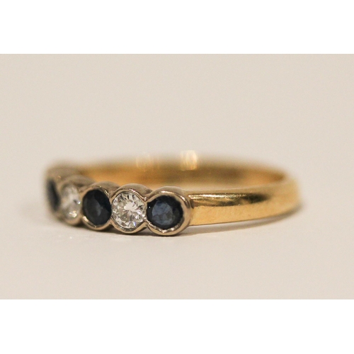 614 - Modern 18ct yellow gold sapphire and diamond half hoop eternity ring. Ring size J