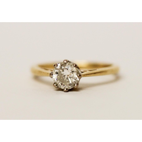 621 - A solitaire diamond engagement ring, set with a brilliant cut diamond of three quarters of a carat, ... 