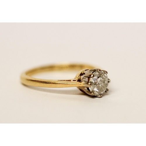 621 - A solitaire diamond engagement ring, set with a brilliant cut diamond of three quarters of a carat, ... 