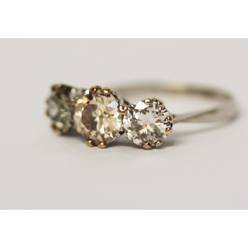 625 - Three stone diamond ring set with three old brilliant cut diamonds, total carat weight estimated to ... 