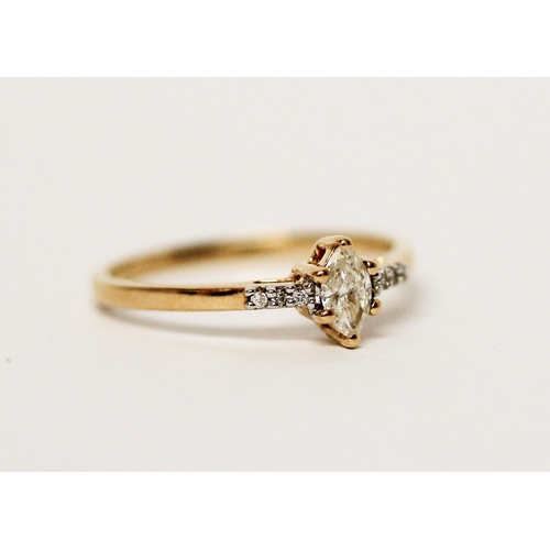 629 - 18ct yellow gold marquis diamond ring with diamond shoulders. Hallmarked ring size N