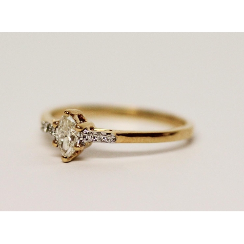 629 - 18ct yellow gold marquis diamond ring with diamond shoulders. Hallmarked ring size N