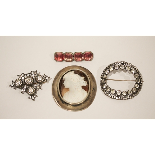 631 - Two 19th century paste brooches, a large silver framed cameo and a pink paste bar brooch