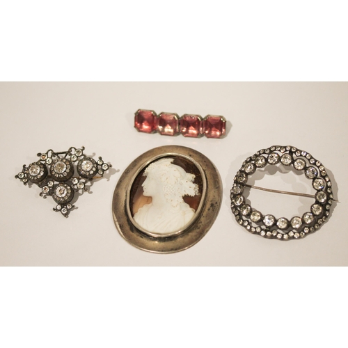 631 - Two 19th century paste brooches, a large silver framed cameo and a pink paste bar brooch