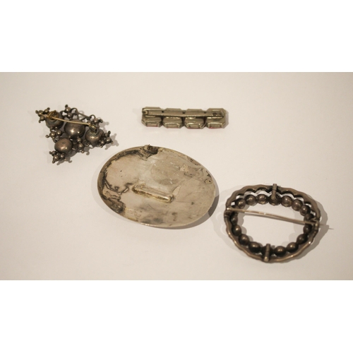 631 - Two 19th century paste brooches, a large silver framed cameo and a pink paste bar brooch