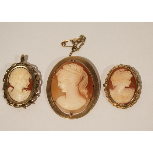 663 - A collection of three modern shell cameo brooches, all hallmarked or marked 375