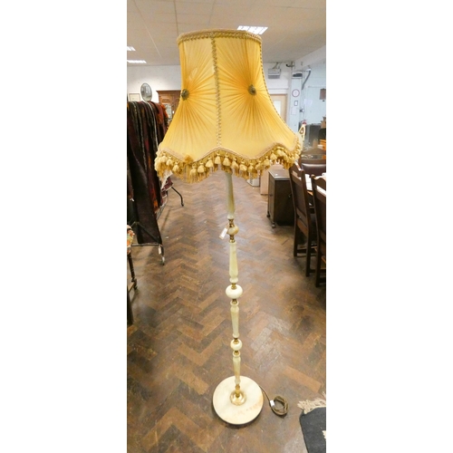 336 - An onyx standard lamp with shade