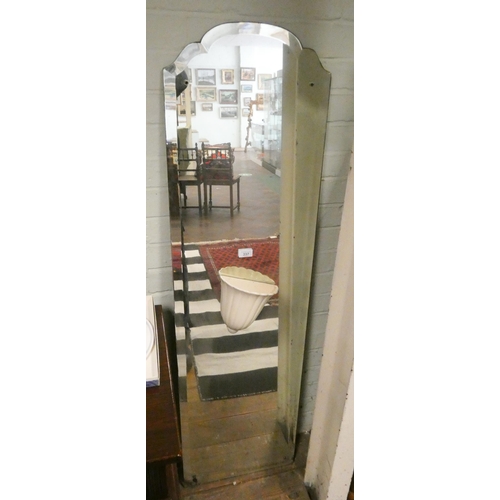 337 - A bevelled frameless dressing mirror with planter attached