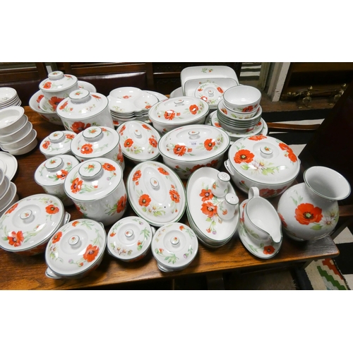 339 - A large collection of Royal Worcester poppy design store jars, casserole dishes, plates, vase and ot... 