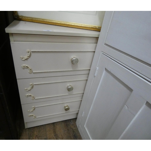 29 - Cream finished chest of three long drawers