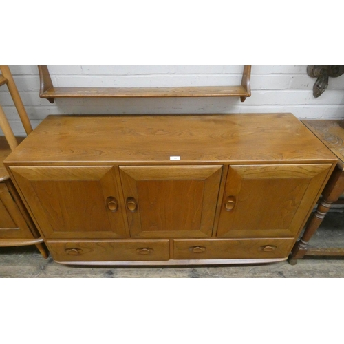 37 - Ercol Blond sideboard fitted three doors with two drawers to the base