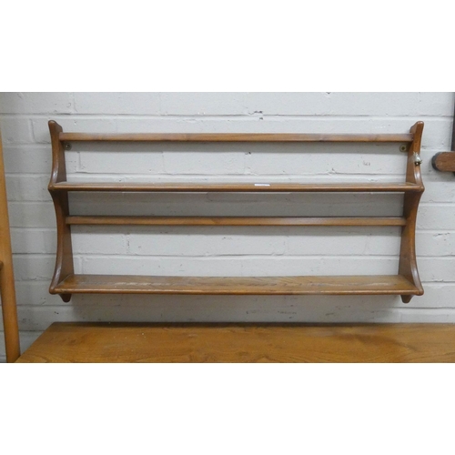 38 - Ercol Blond wall hanging display rack