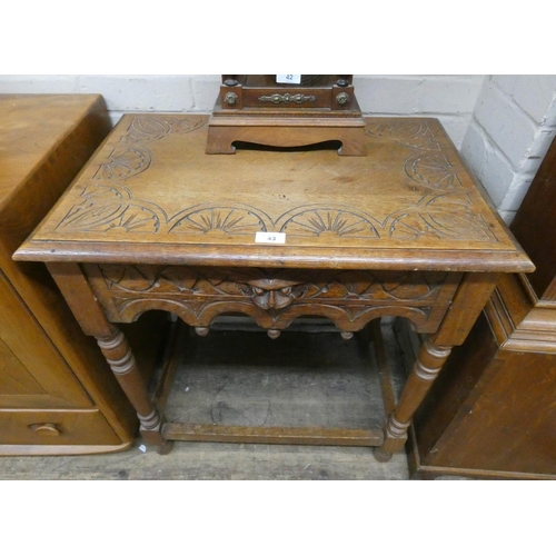 43 - Edwardian carved oak side table, fitted drawer with carved lion mask handle