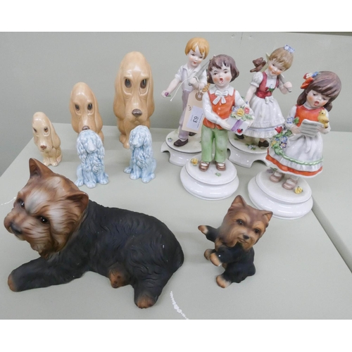 63 - Set of three Sylvac graduated dogs, other dog ornaments & figurines of children