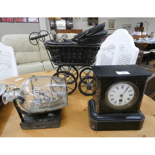 78 - Victorian black slate mantle clock, vintage miniature dolls pram and a ship in a bottle