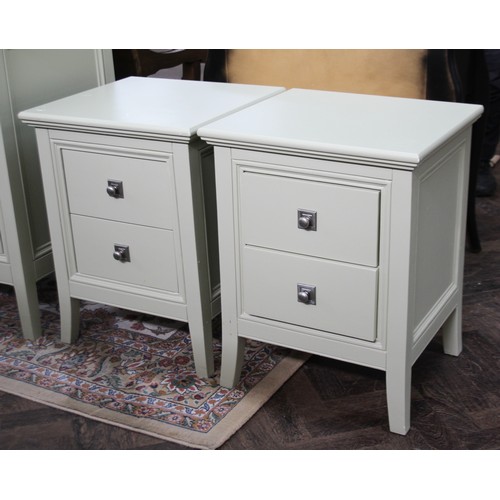 61 - Pair of matching pale green painted  bedside cabinets with three drawers to each