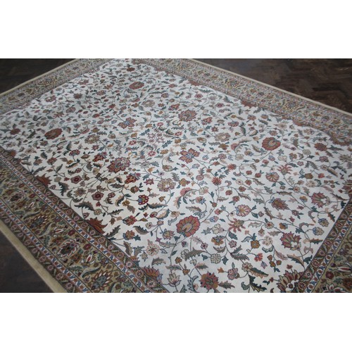 76 - Large modern Persian design carpet in shades of neutral beige, size approx 8' x 12'