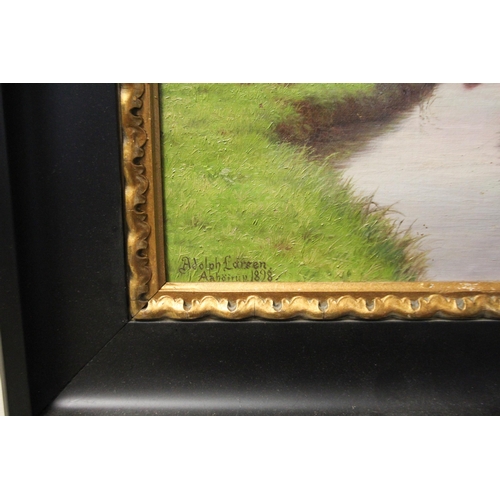 234 - Adolph Larsen oil on canvas depicting a Dutch river landscape with cattle, signed and dated lower le... 