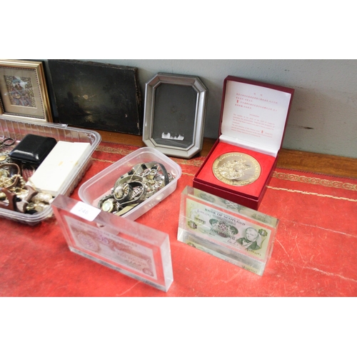 246 - Two bank notes, medallion, costume jewellery, watches and other collectables