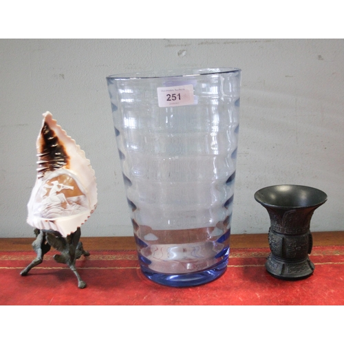 251 - A large blue art glass vase, carved cameo shell and a small bronze vase