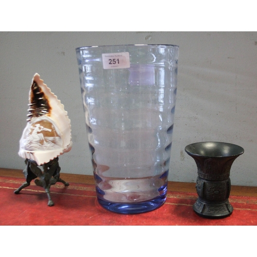 251 - A large blue art glass vase, carved cameo shell and a small bronze vase