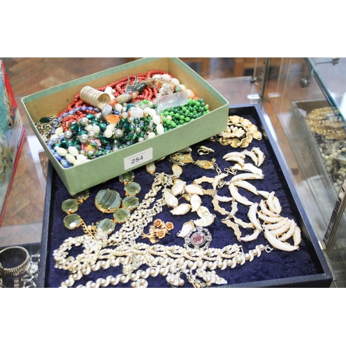 254 - Assorted bead necklaces, costume jewellery etc