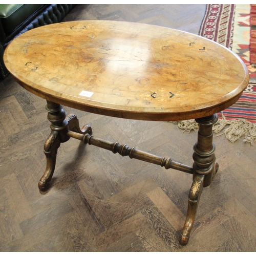 473 - A Victorian inlaid walnut oval centre table on pillar and stretcher style base, 3' wide