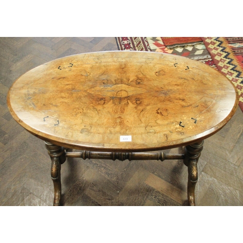 473 - A Victorian inlaid walnut oval centre table on pillar and stretcher style base, 3' wide