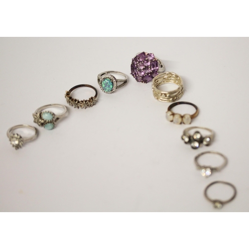 695 - A collection of silver ladies stone set dress rings